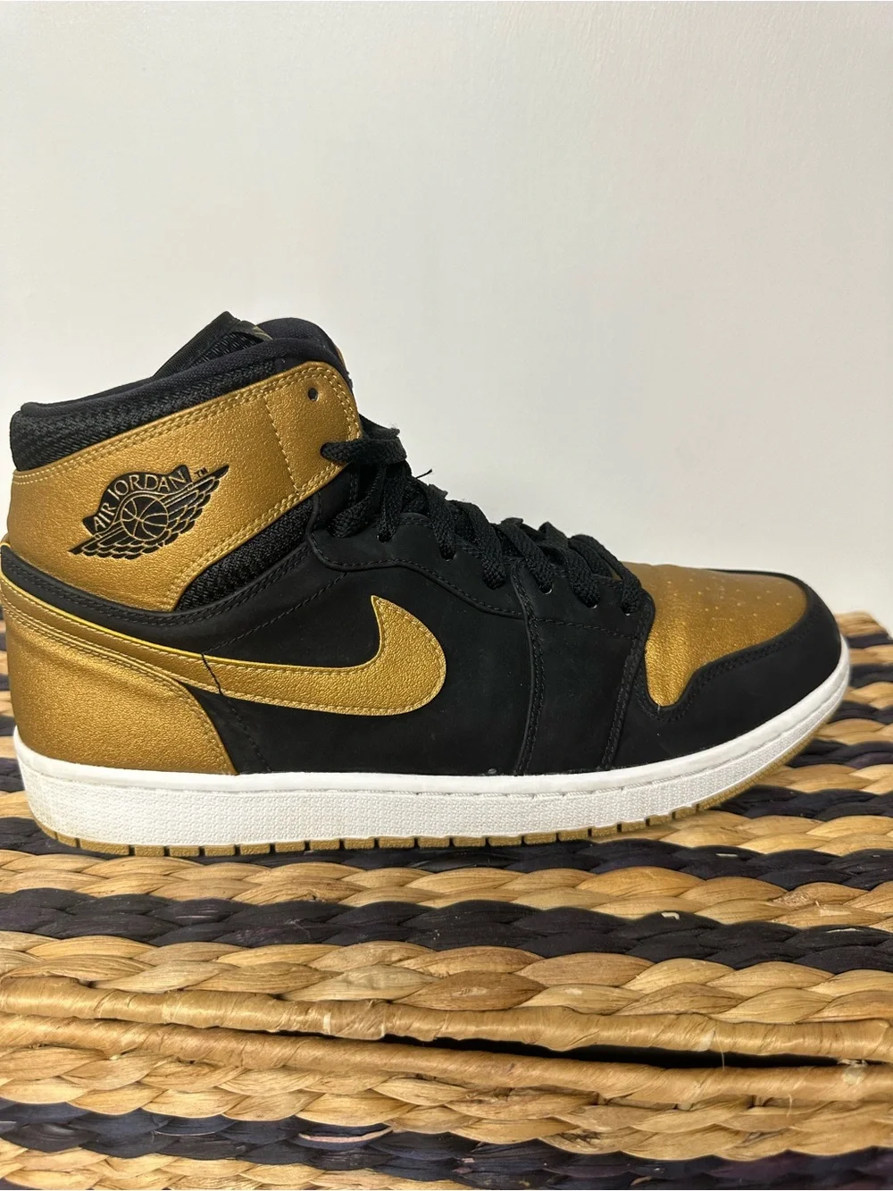 Jordan 1 High-Top Sneakers in Black and Gold